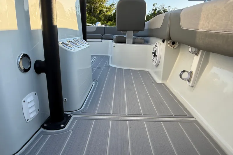 Slide: The Image of 2025 Caymas 281 HB boat interior with sleek seating and modern design elements. - 46