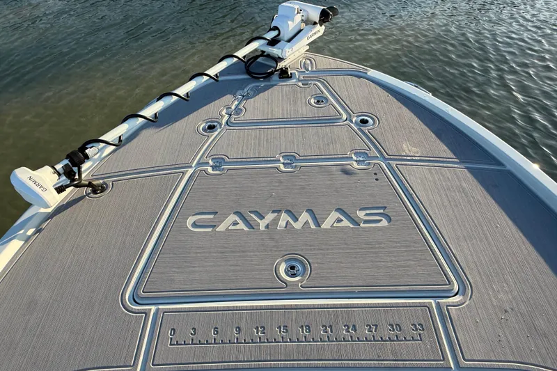 Slide: The Image of Bow of 2025 Caymas 281 HB boat with Garmin equipment on calm water. - 53