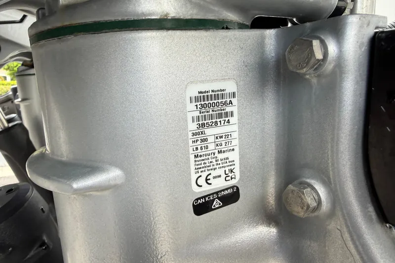 Slide: The Image of Close-up of a Mercury Marine engine label on a 2025 Caymas 281 HB boat. - 66