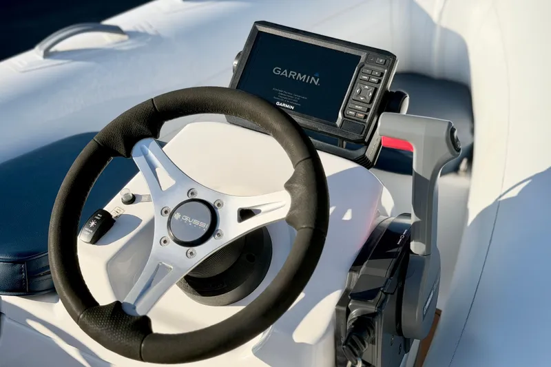 Slide: The Image of Steering console of 2018 Brig Falcon 360 with Garmin navigation system. - 4