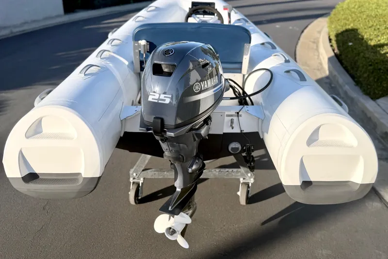 Slide: The Image of 2018 Brig Falcon 360 inflatable boat with Yamaha 25 outboard motor on trailer. - 8