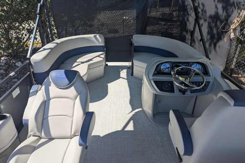 Slide: The Image of Luxurious interior of 2026 Dockside 22DQ2.75 boat with plush seating and modern dashboard. - 5