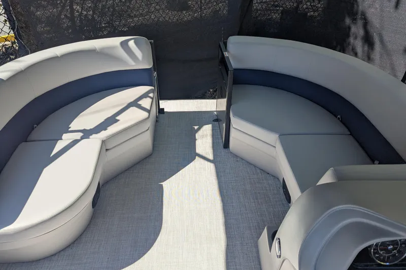 Slide: The Image of Luxurious seating area on a 2026 Dockside 22DQ2.75 boat, featuring elegant upholstery. - 6