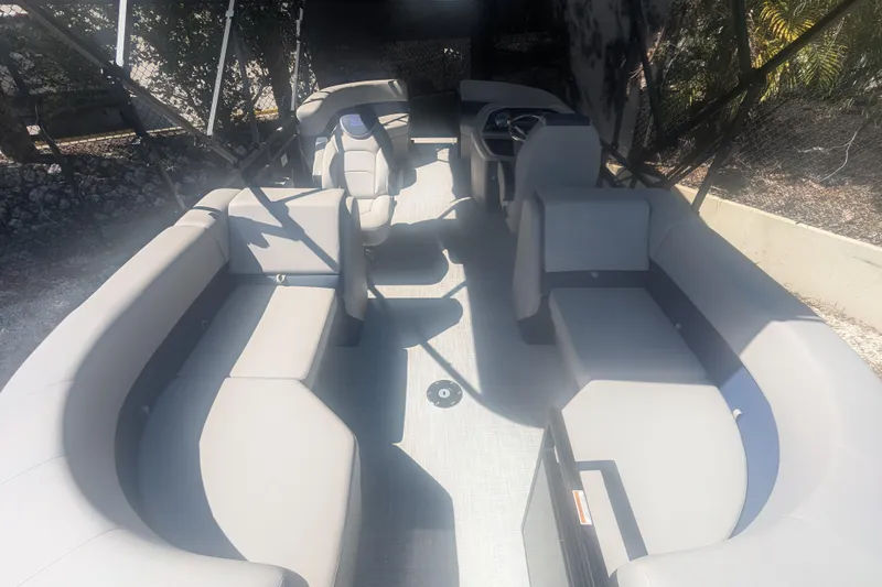 Slide: The Image of Interior view of 2026 Dockside 22DQ2.75 boat with spacious seating and modern design. - 7