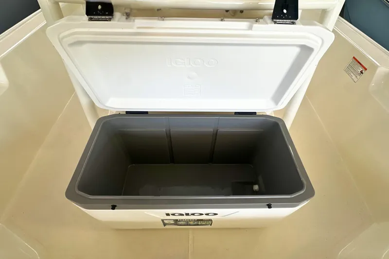 Slide: The Image of Open Igloo cooler inside a 2026 Boston Whaler 190 Montauk boat. - 19