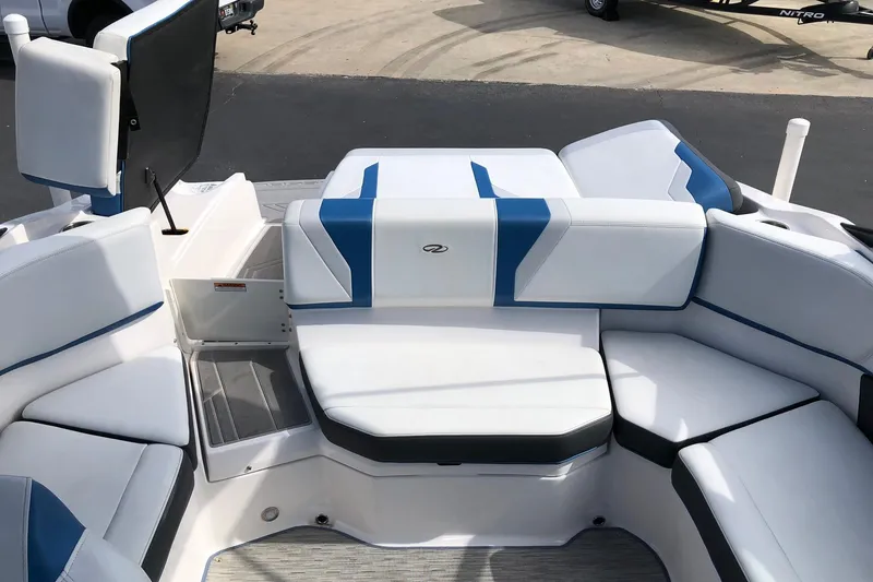 Slide: The Image of 2015 Regal 2000 ESX Bowrider interior with white and blue seating arrangement. - 16
