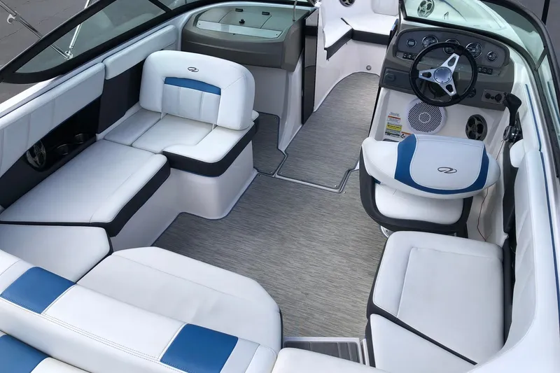 Slide: The Image of Interior of a 2015 Regal 2000 ESX Bowrider with sleek seating and modern dashboard. - 22