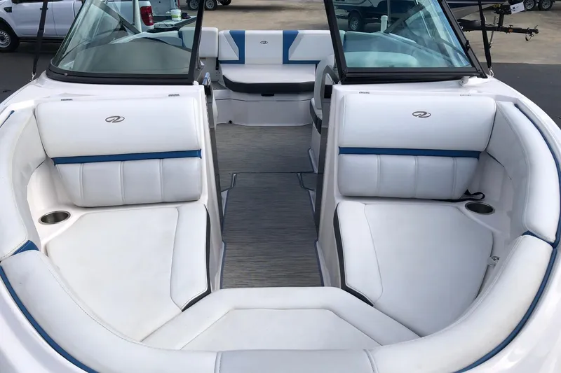 Slide: The Image of 2015 Regal 2000 ESX Bowrider interior with white and blue seating. - 9
