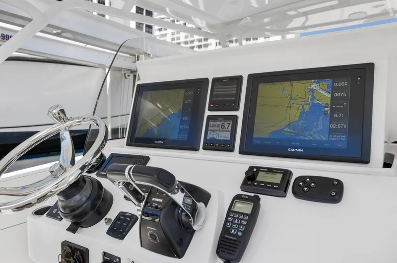 Slide: The Image of 2016 Intrepid 400 Cuddy helm with advanced navigation systems and controls. - 30