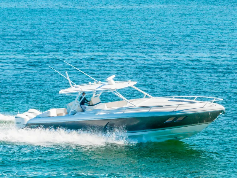 Slide: The Image of 2016 Intrepid 400 Cuddy cruising on open water. - 5