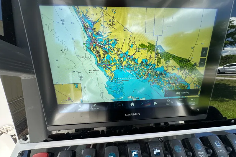 Slide: The Image of Garmin marine GPS displaying nautical chart on 2023 Sea Hunt BX 25 BR boat. - 18