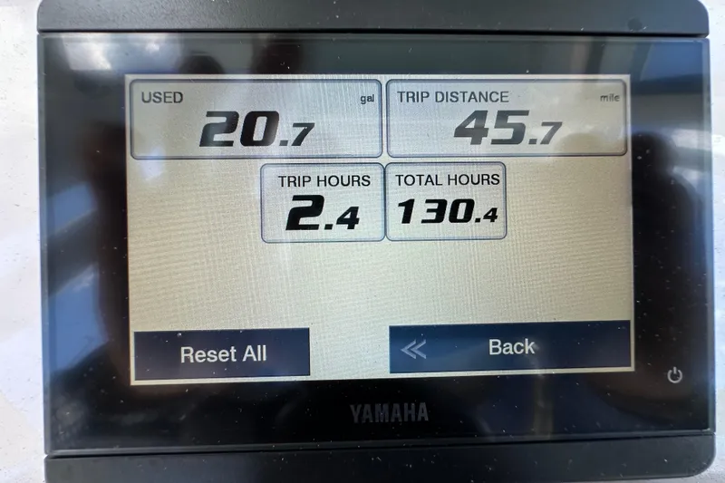 Slide: The Image of Display screen showing fuel usage, trip distance, and hours for 2023 Sea Hunt BX 25 BR. - 19