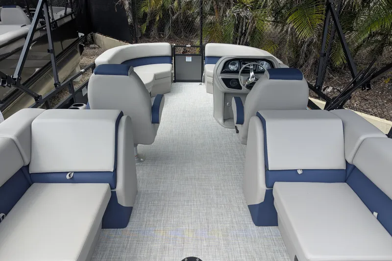 Slide: The Image of Interior of 2026 Dockside 22DQ2.75 pontoon boat with spacious seating and modern dashboard. - 5