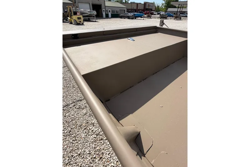 Slide: The Image of 2026 Weld-Craft 1652FN boat interior, showcasing spacious deck and sturdy construction. - 6