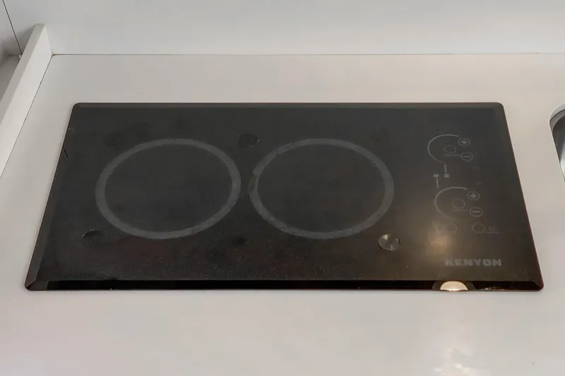 Slide: The Image of Kenyon electric cooktop on 2017 Beneteau Gran Turismo 46 yacht kitchen counter. - 19