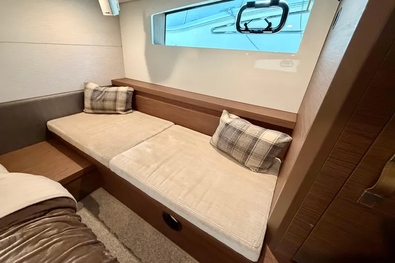 Slide: The Image of Interior of 2017 Beneteau Gran Turismo 46 yacht with cozy seating and cushions. - 23