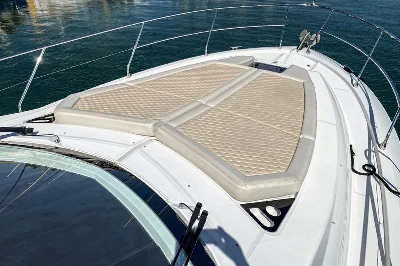 Slide: The Image of 2017 Beneteau Gran Turismo 46 yacht with sunbathing cushions on deck. - 27