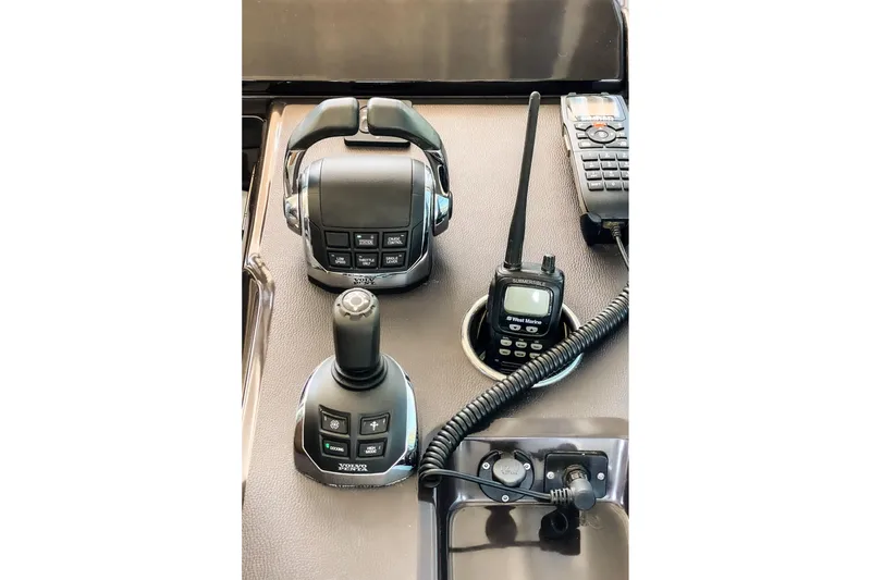 Slide: The Image of Control panel of 2017 Beneteau Gran Turismo 46 with joystick and radio equipment. - 29