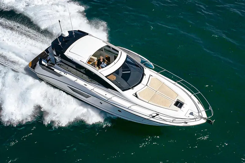 Slide: The Image of 2017 Beneteau Gran Turismo 46 yacht cruising on open water. - 37