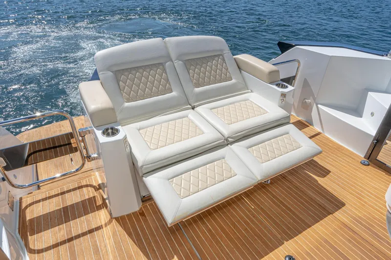 Slide: The Image of Luxurious seating on 2017 Beneteau Gran Turismo 46 yacht, featuring elegant quilted upholstery. - 5