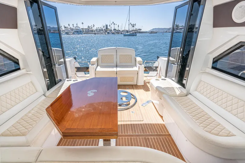 Slide: The Image of Luxurious interior of 2017 Beneteau Gran Turismo 46 yacht with elegant seating and ocean view. - 7