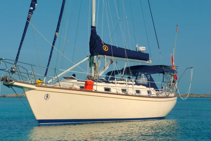 The Image of 1995 Island Packet 37 sailboat on calm waters. - 0