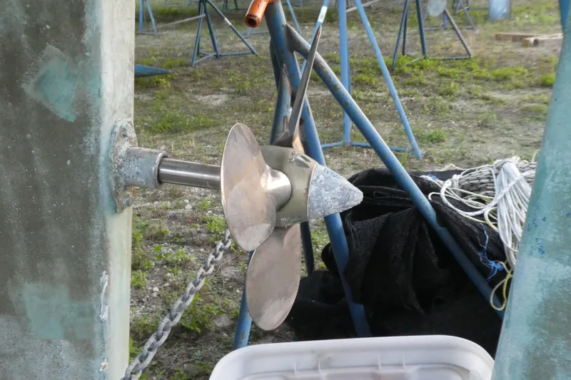Slide: The Image of Propeller of a 1995 Island Packet 37 sailboat on a stand. - 11