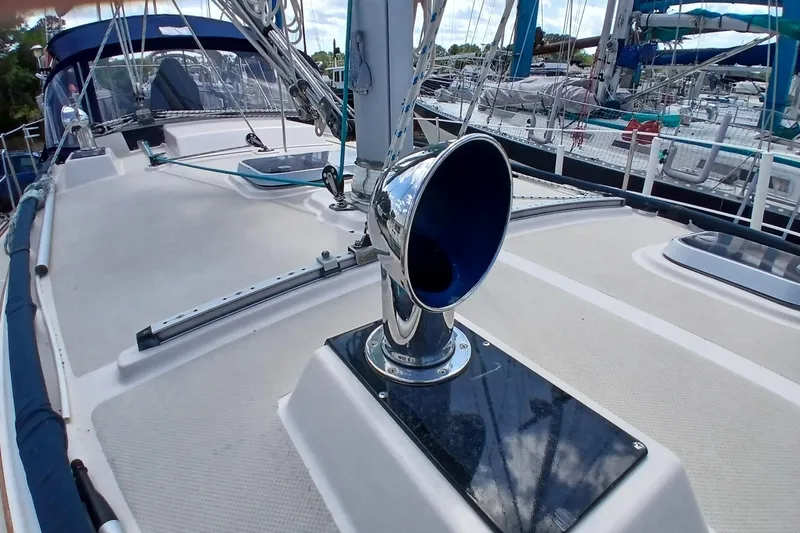 Slide: The Image of 1995 Island Packet 37 sailboat deck with chrome vent and rigging details. - 72