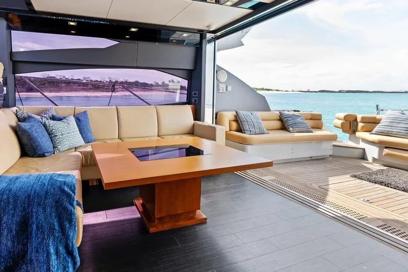 Slide: The Image of Luxurious interior of 2011 Sunseeker Predator 64 yacht with ocean view and plush seating. - 23
