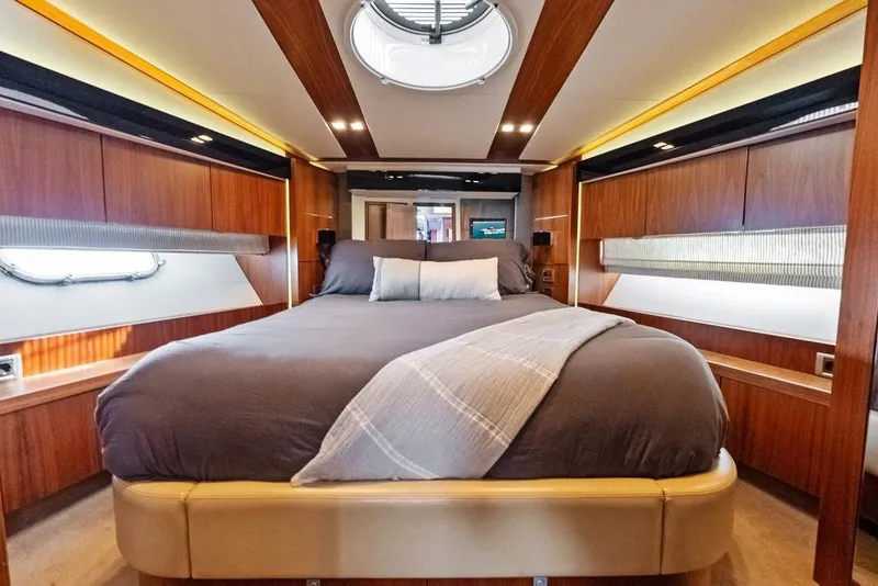 Slide: The Image of Luxurious bedroom interior of 2011 Sunseeker Predator 64 yacht with elegant wood finishes. - 25