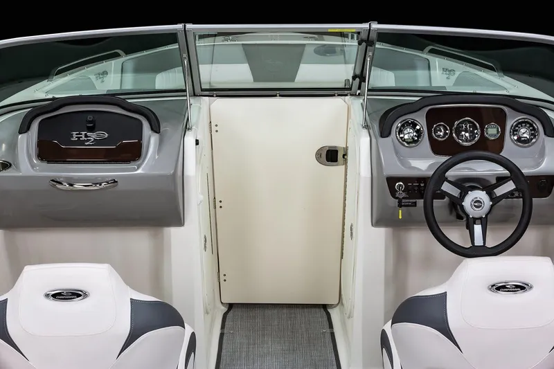 Slide: The Image of Manufacturer Provided Image: 2019 Chaparral 23 H2O Sport boat interior, featuring dashboard and steering wheel. - 3