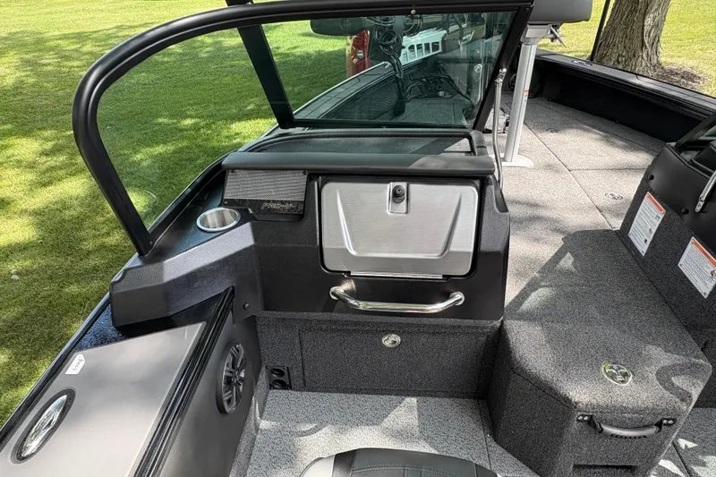 Slide: The Image of Interior of 2026 Lund 2075 Pro-V Sport boat with seating and storage compartments. - 20