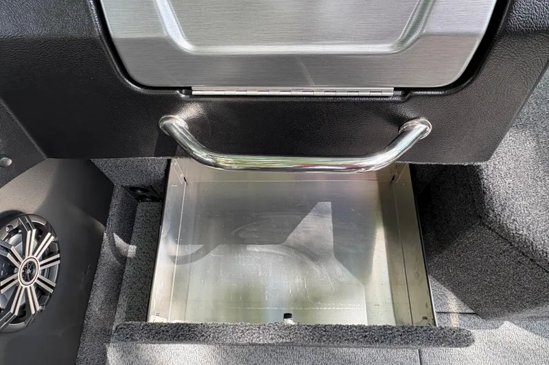 Slide: The Image of Open storage compartment in 2026 Lund 2075 Pro-V Sport boat interior. - 22