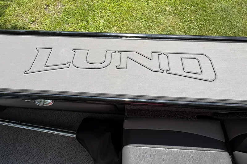 Slide: The Image of 2026 Lund 2075 Pro-V Sport boat interior with embossed logo on seating. - 29