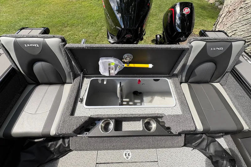 Slide: The Image of 2026 Lund 2075 Pro-V Sport boat interior with seating and storage compartments. - 34