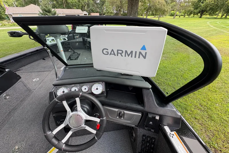 Slide: The Image of 2026 Lund 2075 Pro-V Sport boat dashboard with Garmin navigation system. - 40