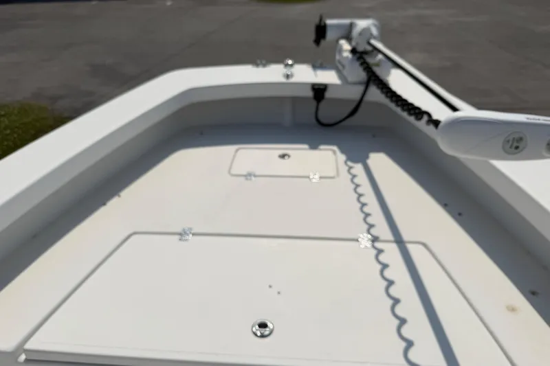 Slide: The Image of 2021 Intruder 23 boat deck with mounted equipment, viewed from above. - 13