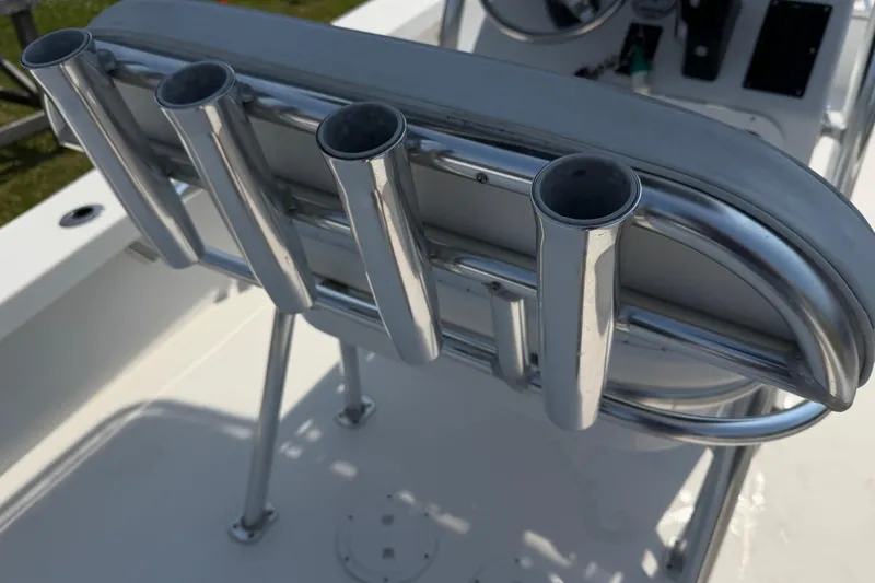 Slide: The Image of Stainless steel rod holders on a 2021 Intruder 23 boat, close-up view. - 26