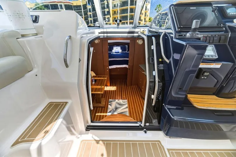 Slide: The Image of 2008 Tiara Yachts 3900 Sovran interior view with wooden flooring and modern cockpit. - 28
