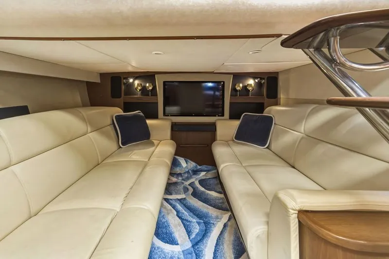 Slide: The Image of Luxurious interior of 2008 Tiara Yachts 3900 Sovran with plush seating and entertainment system. - 29