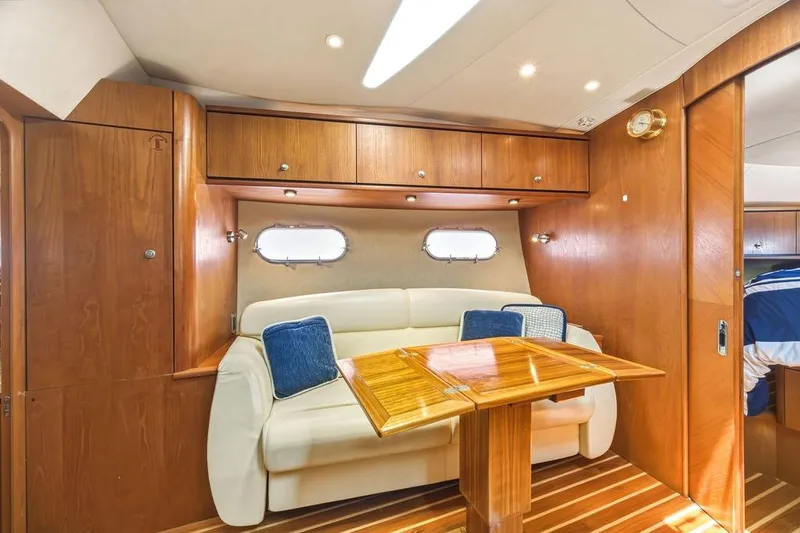 Slide: The Image of Luxurious interior of 2008 Tiara Yachts 3900 Sovran with elegant wood finish and cozy seating. - 33
