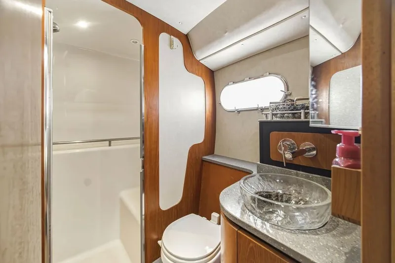 Slide: The Image of Luxurious bathroom in 2008 Tiara Yachts 3900 Sovran, featuring modern fixtures and elegant design. - 35