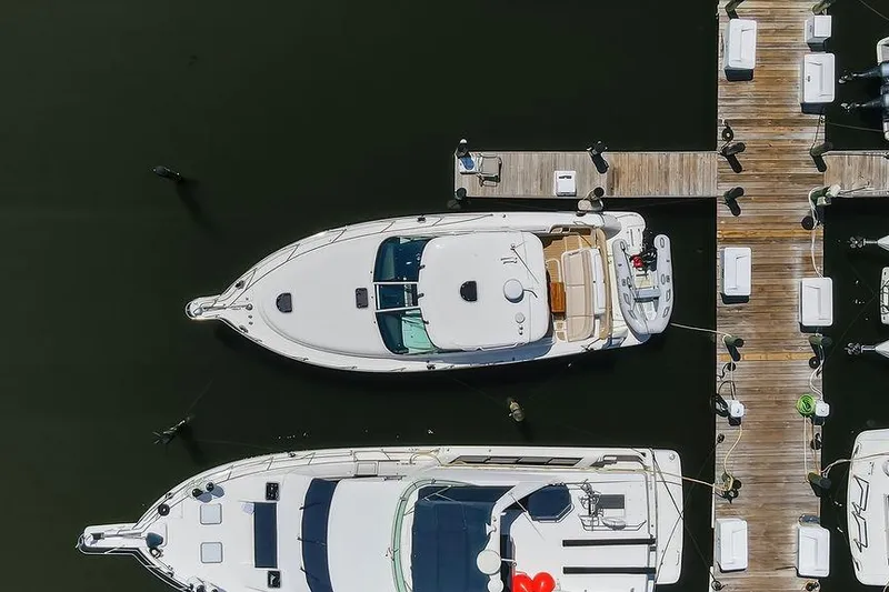 Slide: The Image of Aerial view of a 2008 Tiara Yachts 3900 Sovran docked at a marina. - 7