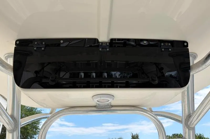 Slide: The Image of 2023 Key West 203 FS boat console with black panel and overhead view. - 30