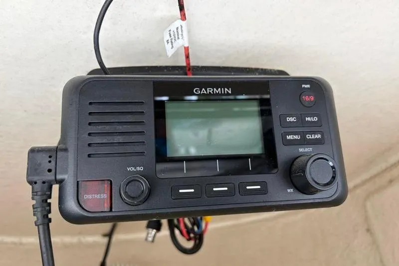 Slide: The Image of Garmin marine radio installed on a 2023 Key West 203 FS boat. - 31