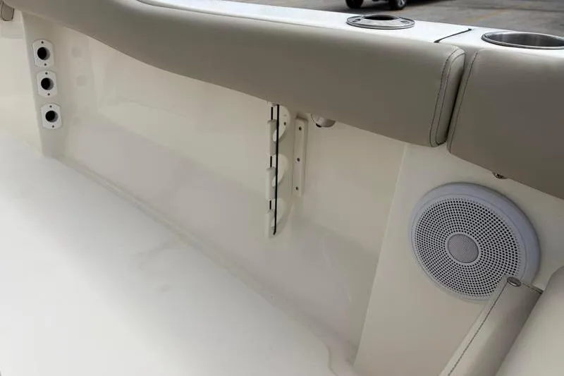 Slide: The Image of 2023 Key West 203 FS boat interior with speaker and cup holders. - 36