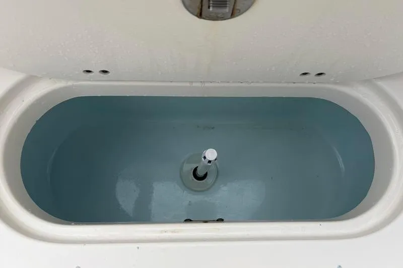 Slide: The Image of Livewell compartment in 2023 Key West 203 FS boat, open and empty. - 38