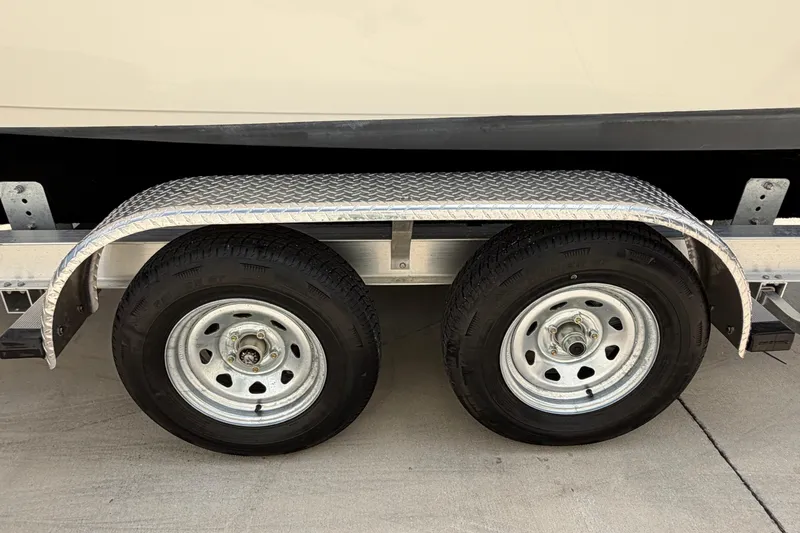Slide: The Image of 2023 Key West 203 FS trailer with dual wheels and diamond plate fender. - 42