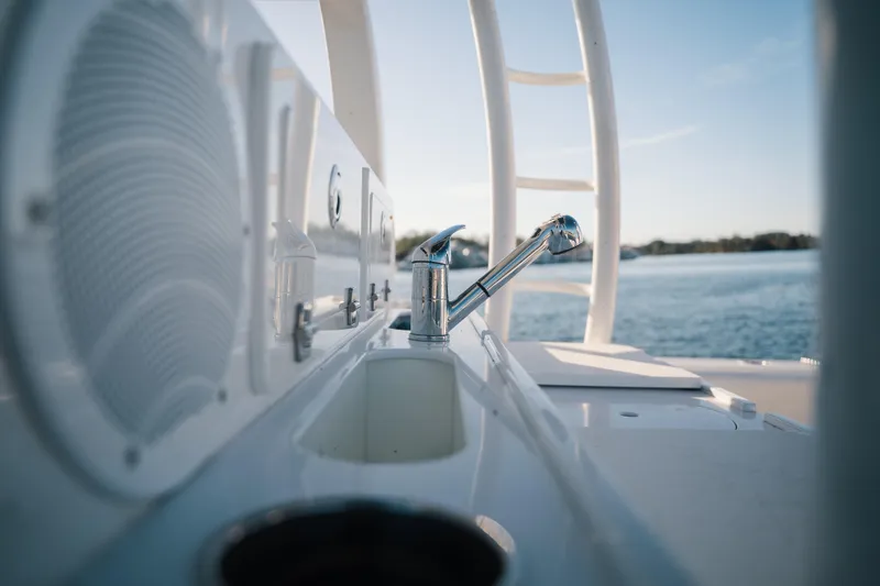 Slide: The Image of Close-up of 2019 HCB 42 Siesta boat's deck faucet with ocean view. - 28