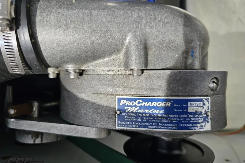 Slide: The Image of ProCharger Marine supercharger on a 1999 Baja 272 boat engine. - 101